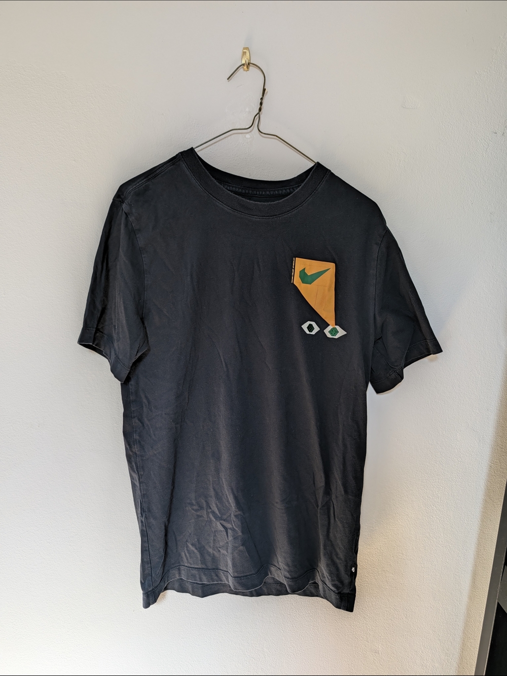 Black Short-Sleeve Tee with Orange and Green Chest Patch
